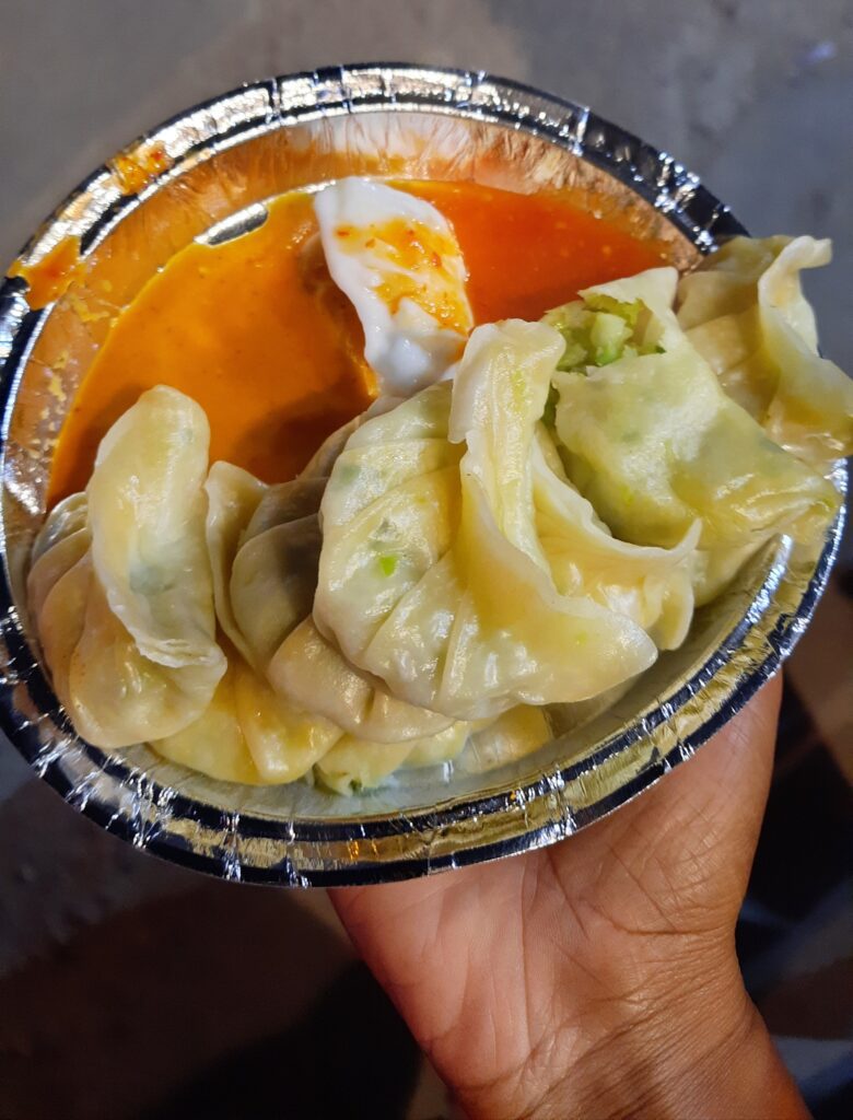 Hot Momos with Spicy Schezwan Chutney